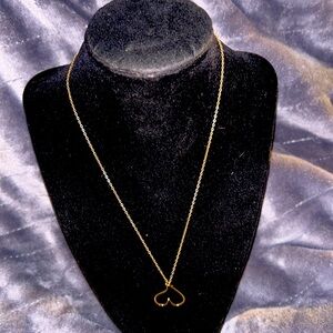 Vintage gold toned necklace with cookie cutter heart pendant